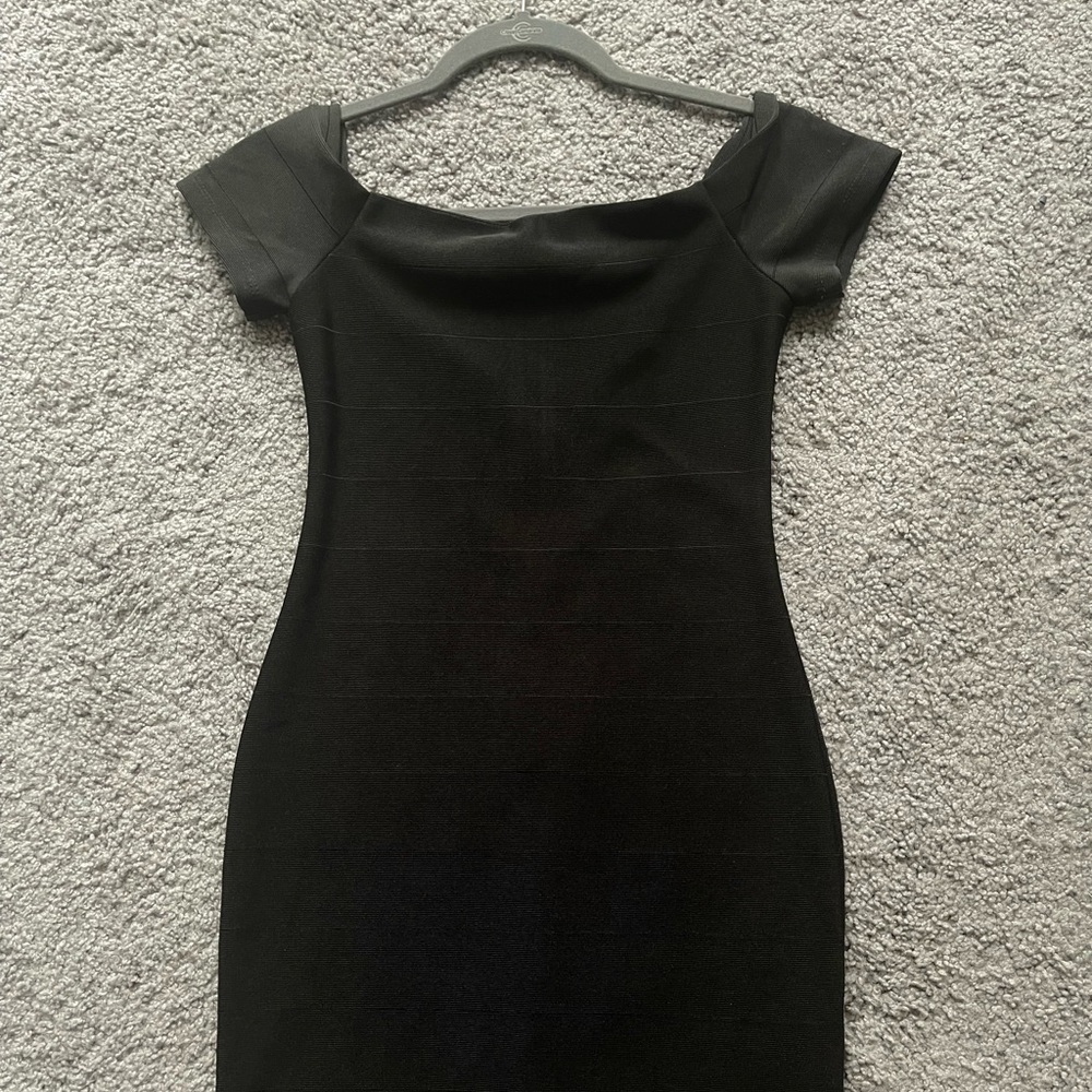 Tight black off the shoulder dress